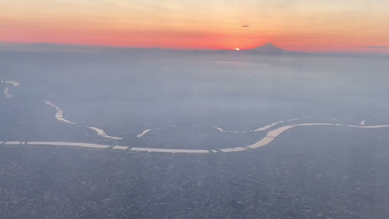 すばらしい夕暮れから、東京都心の風景、着陸まで